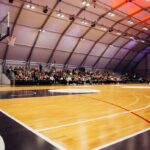 Professional basketball game with players on the court
