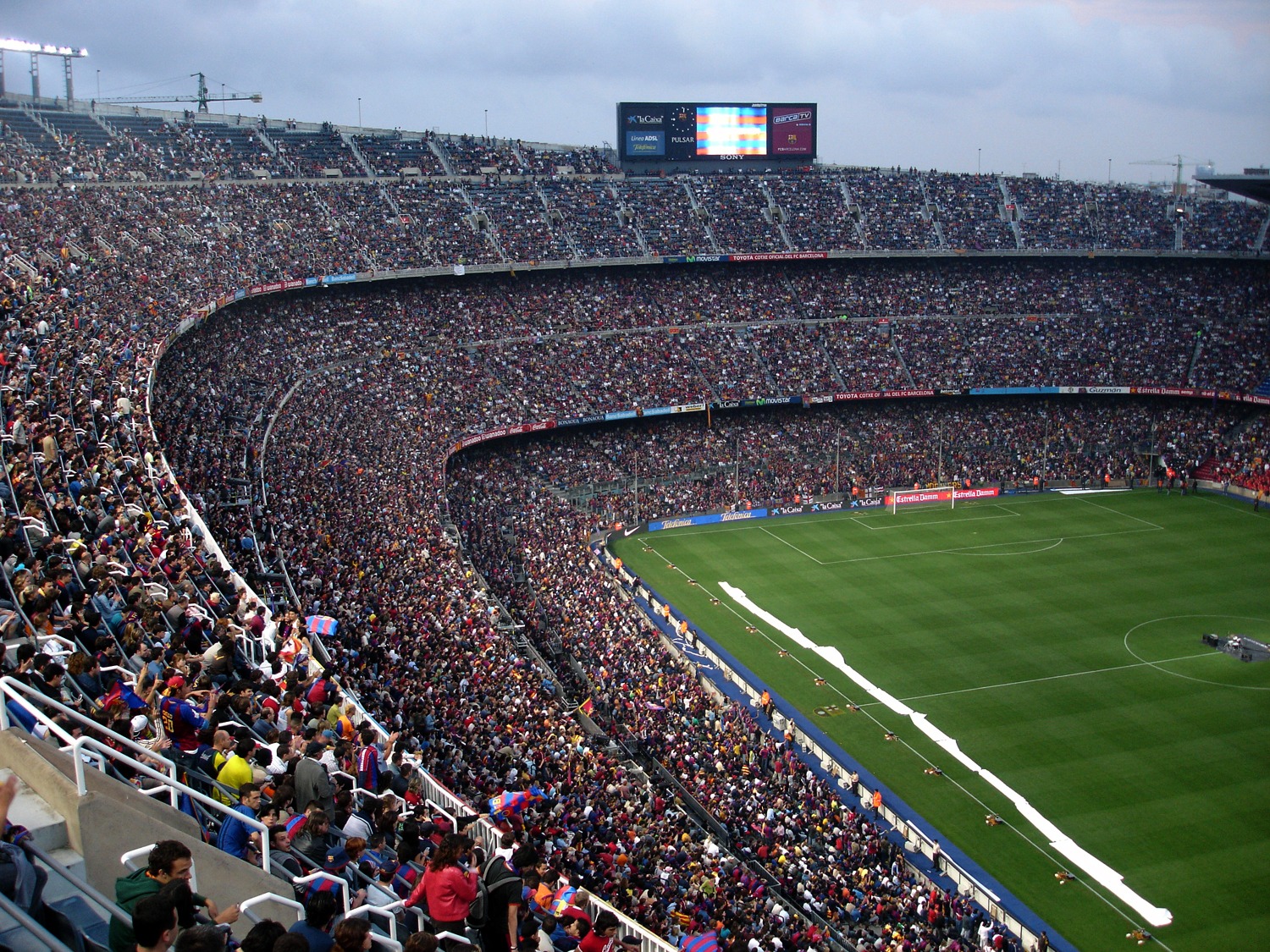Inside Camp Nou in Barcelona with the stands filled with supporters