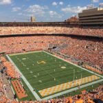 College football stadium and field, generic same-sport imagery for a College Football Playoff explainer