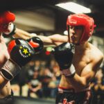 Two boxers competing in a boxing ring