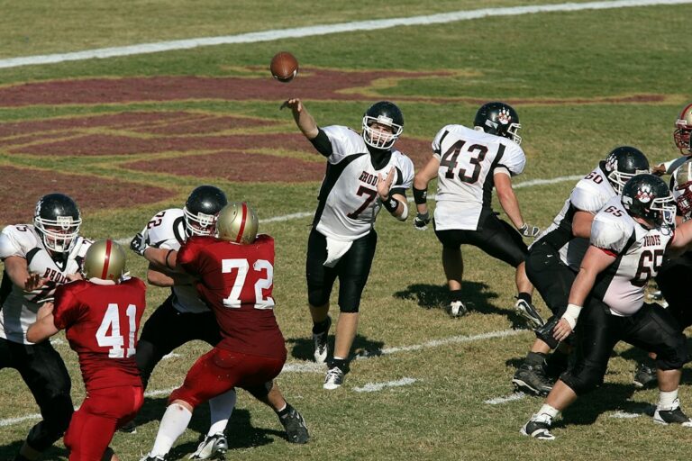 Quarterback throwing a football during a game illustrating an all-time quarterback ranking