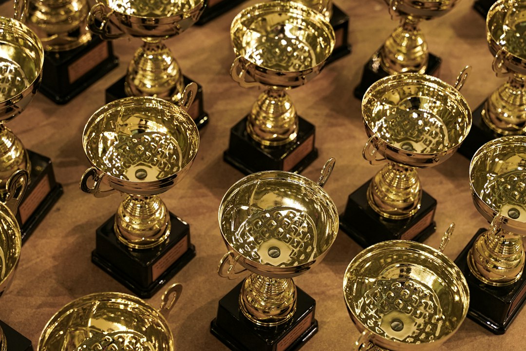 Collection of trophies illustrating championship concentration and sports dynasty criteria