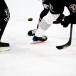 Ice hockey players competing during a game