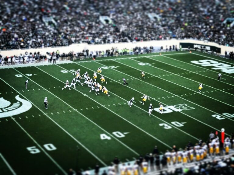 American football game in a stadium illustrating the NFL playoff path