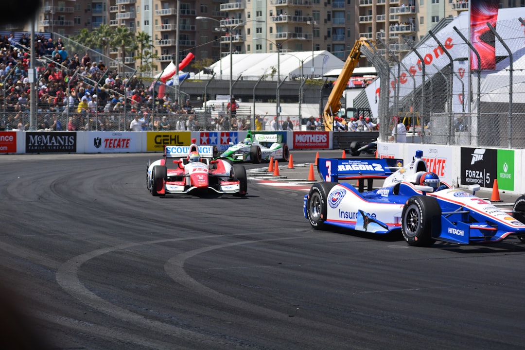 Open-wheel race cars on a street circuit used as generic IndyCar and Formula racing imagery