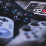 Generic video game controller imagery representing football video games; not a Madden NFL or EA Sports College Football screenshot.
