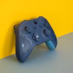 Generic close-up video game controller representing sports video games; not a screenshot from a specific game franchise.