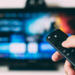 Generic television and streaming setup illustrating sports media rights across broadcast, cable, streaming, and FAST platforms.
