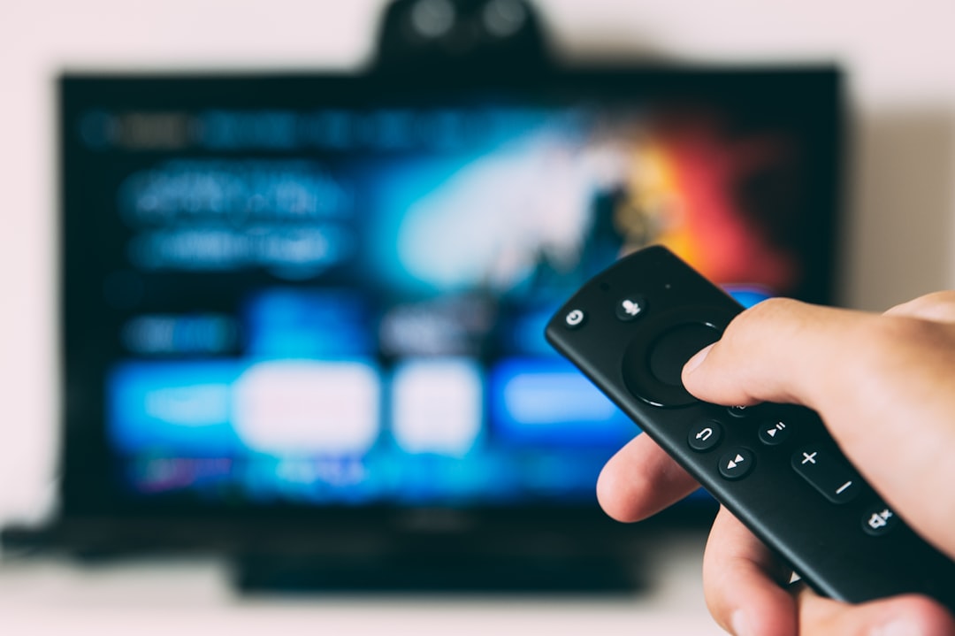 Generic television and streaming setup illustrating sports media rights across broadcast, cable, streaming, and FAST platforms.