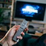 Television in a living room used to represent watching sports movies, TV shows and documentaries