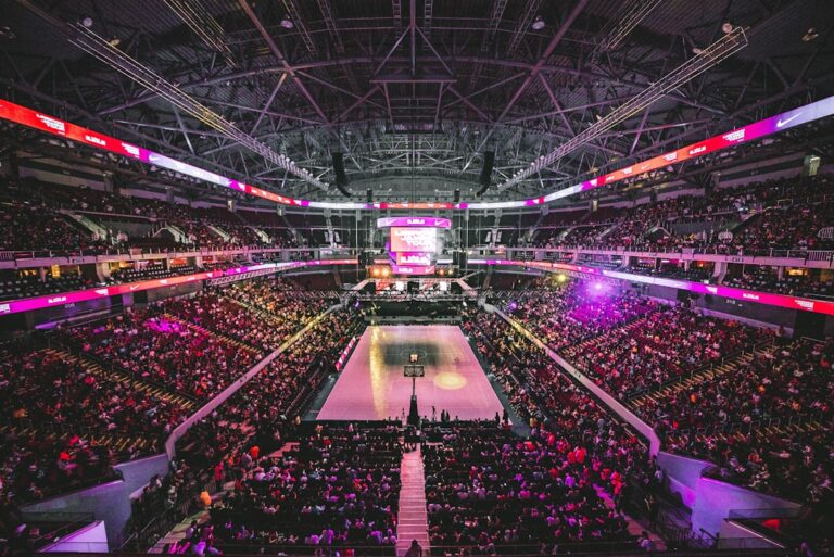 Basketball arena during a game with fans in the stands
