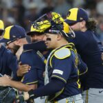 Milwaukee Brewers celebrate after completing a four-game NLCS sweep of the Los Angeles Dodgers